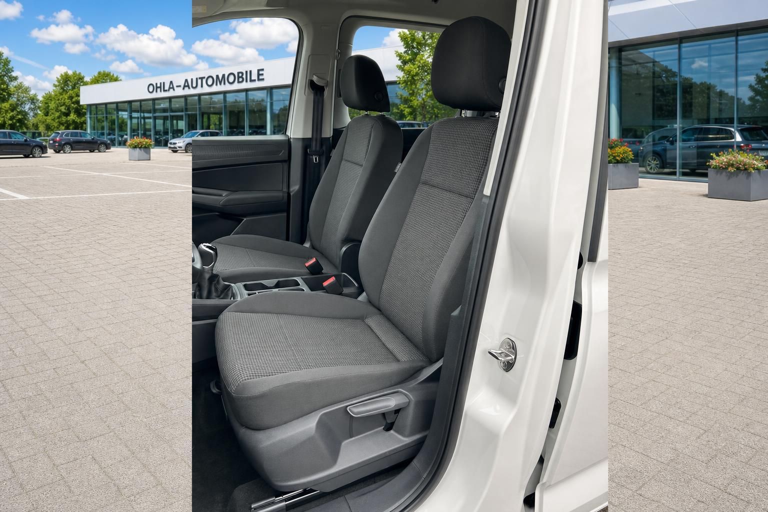 VW Caddy Vordersitze in grauem Stoffbezug Innenansicht