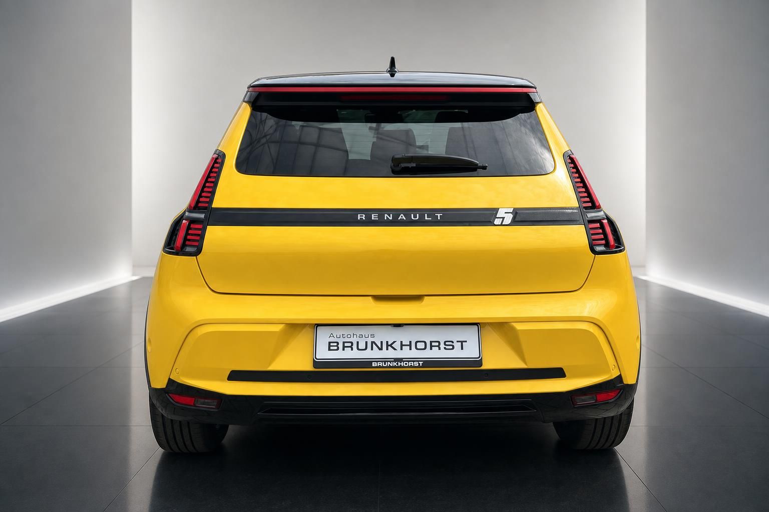Renault 5 E-Tech Electric gelb Heckansicht mit LED-Rückleuchten