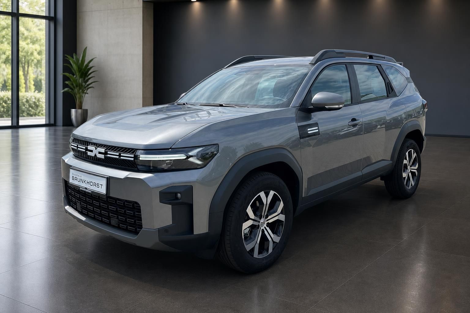 Dacia Bigster SUV in Grau, Seitenansicht schräg von vorne