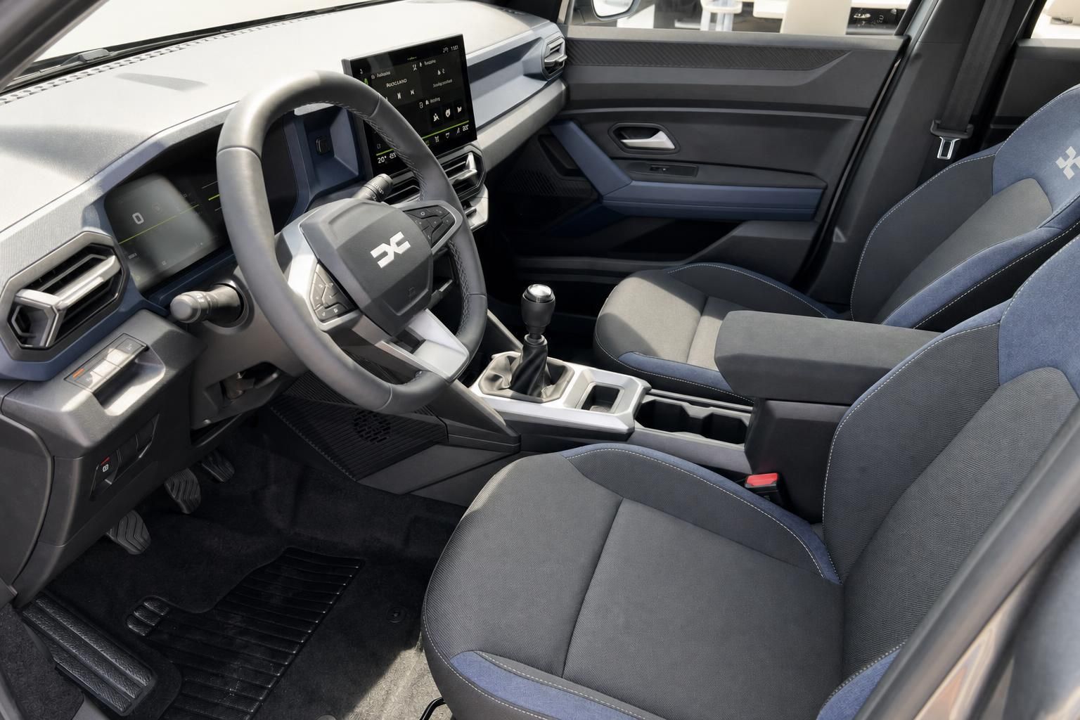 Dacia Bigster Innenraum mit Sitzen, Lenkrad und Schaltknauf