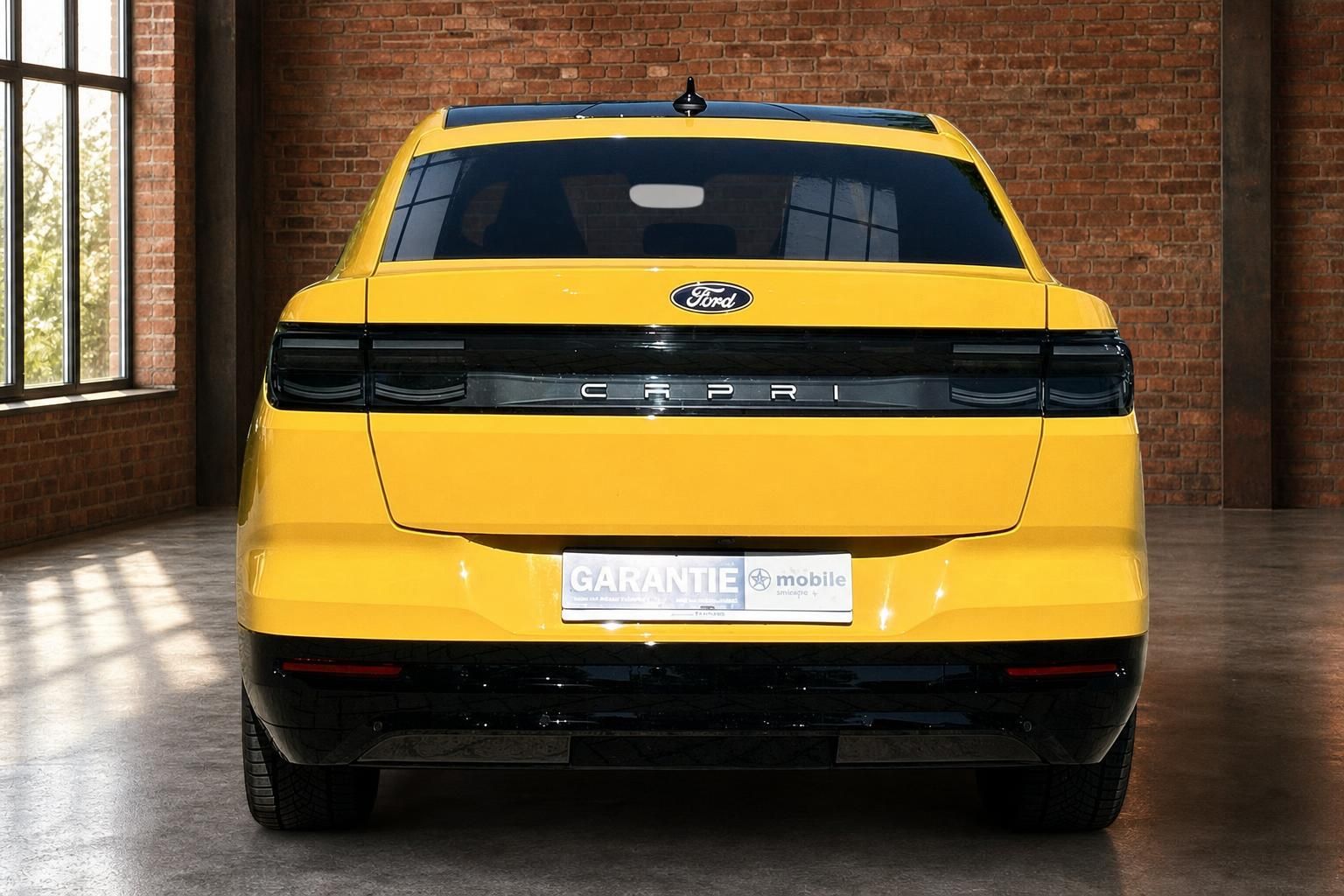 Ford Capri gelb Heckansicht frontal mit Ford Logo