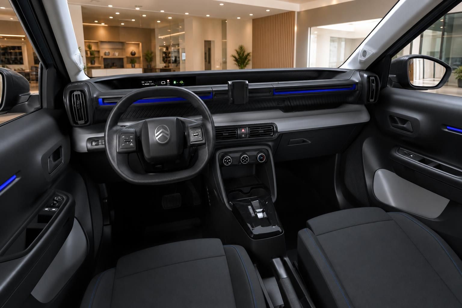 Cockpit und Lenkrad des Citroën ë-C3 mit digitalem Display