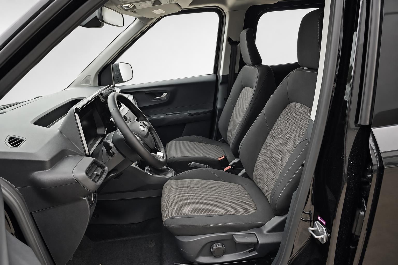 Fahrersitz und Cockpit des Ford Van, Innenraumansicht