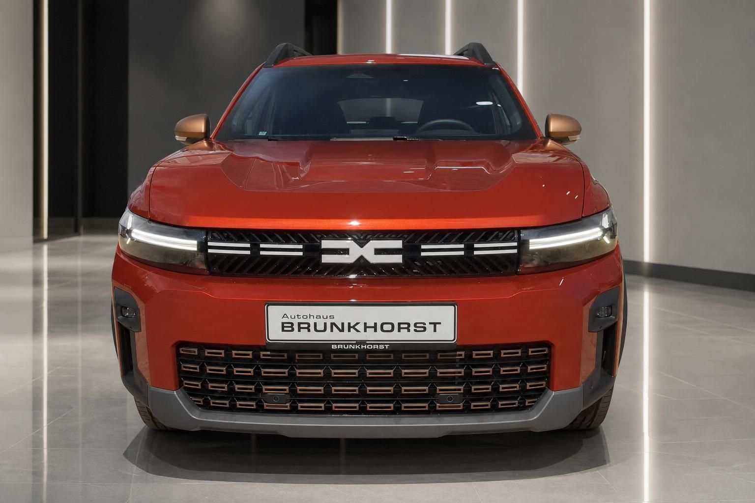 Dacia Bigster in Rot, Frontansicht mit markantem Kühlergrill