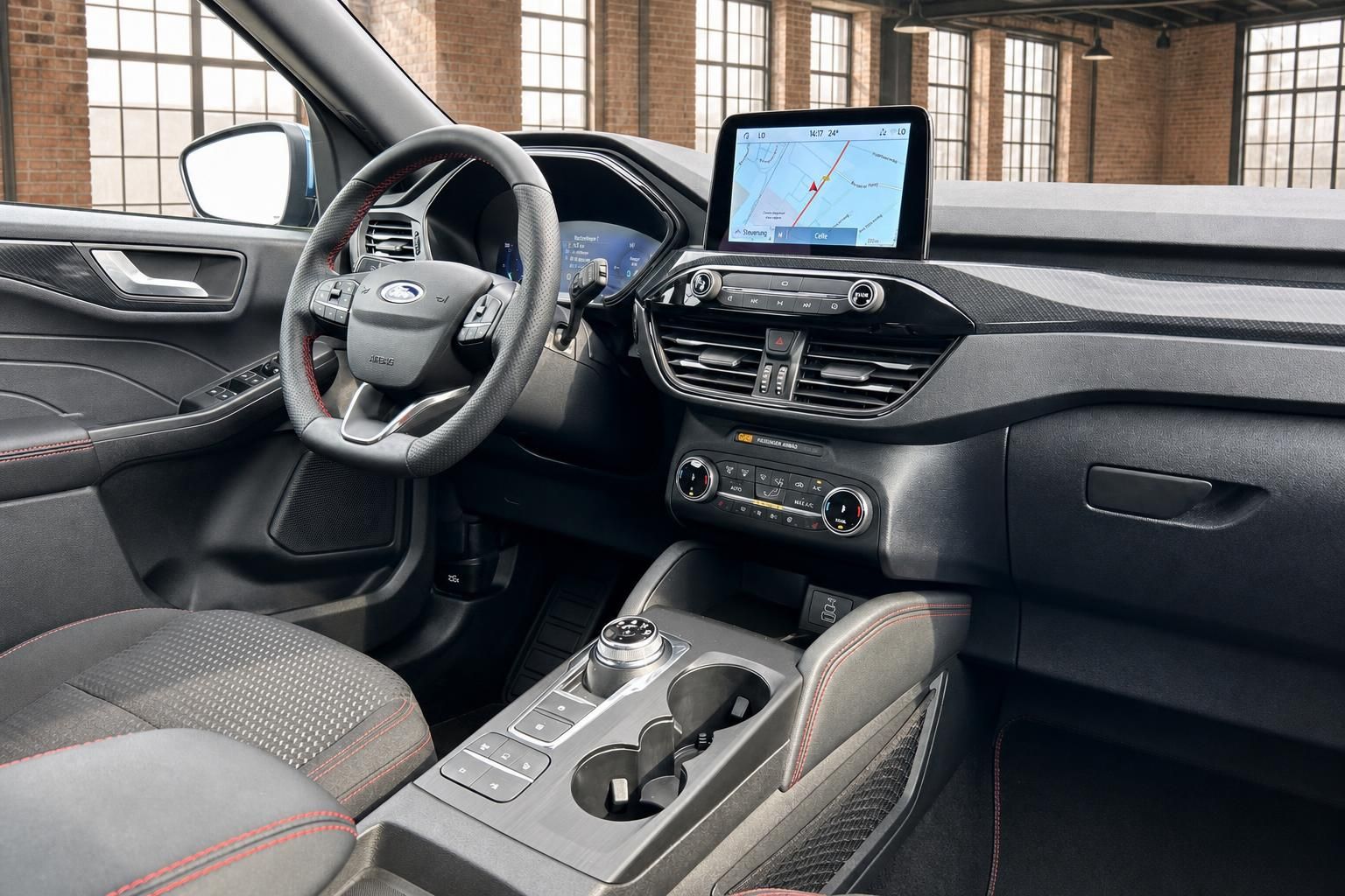 Ford Kuga Interieur Detailansicht von Fahrersitz, Lenkrad und Display