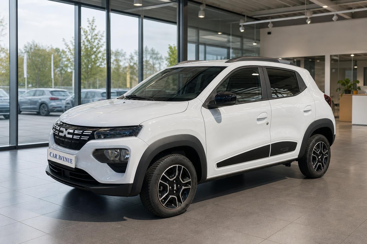 Dacia Spring Elektro weiß, Seitenansicht schräg vorne