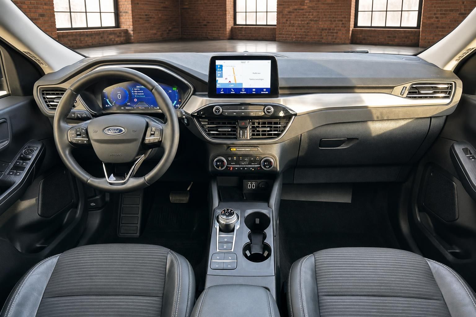 Ford Innenraum Frontansicht mit Cockpit, Lenkrad und Sitzen