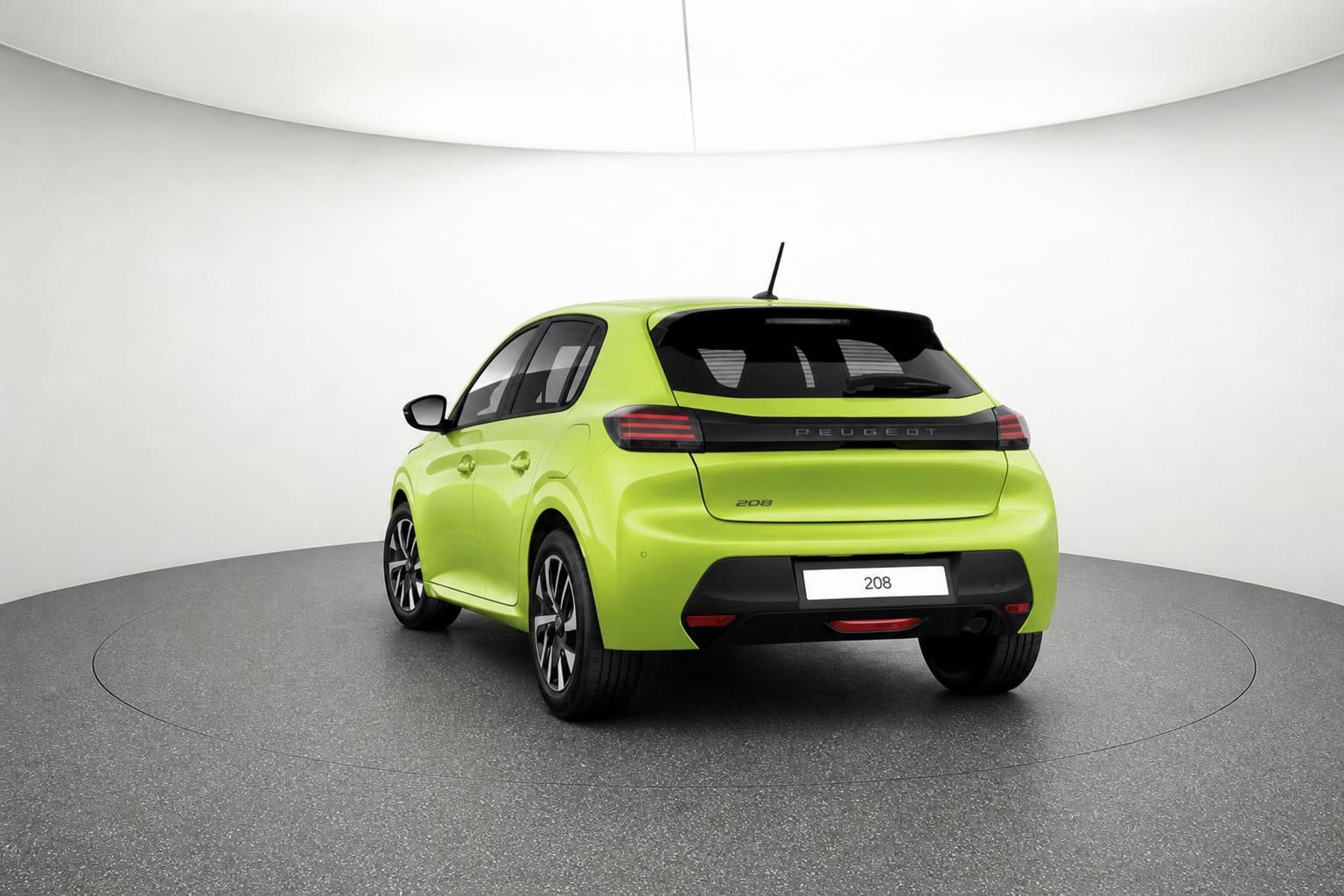 Peugeot 208 Heckansicht in Gelbgrün – Kompaktwagen im Fotostudio