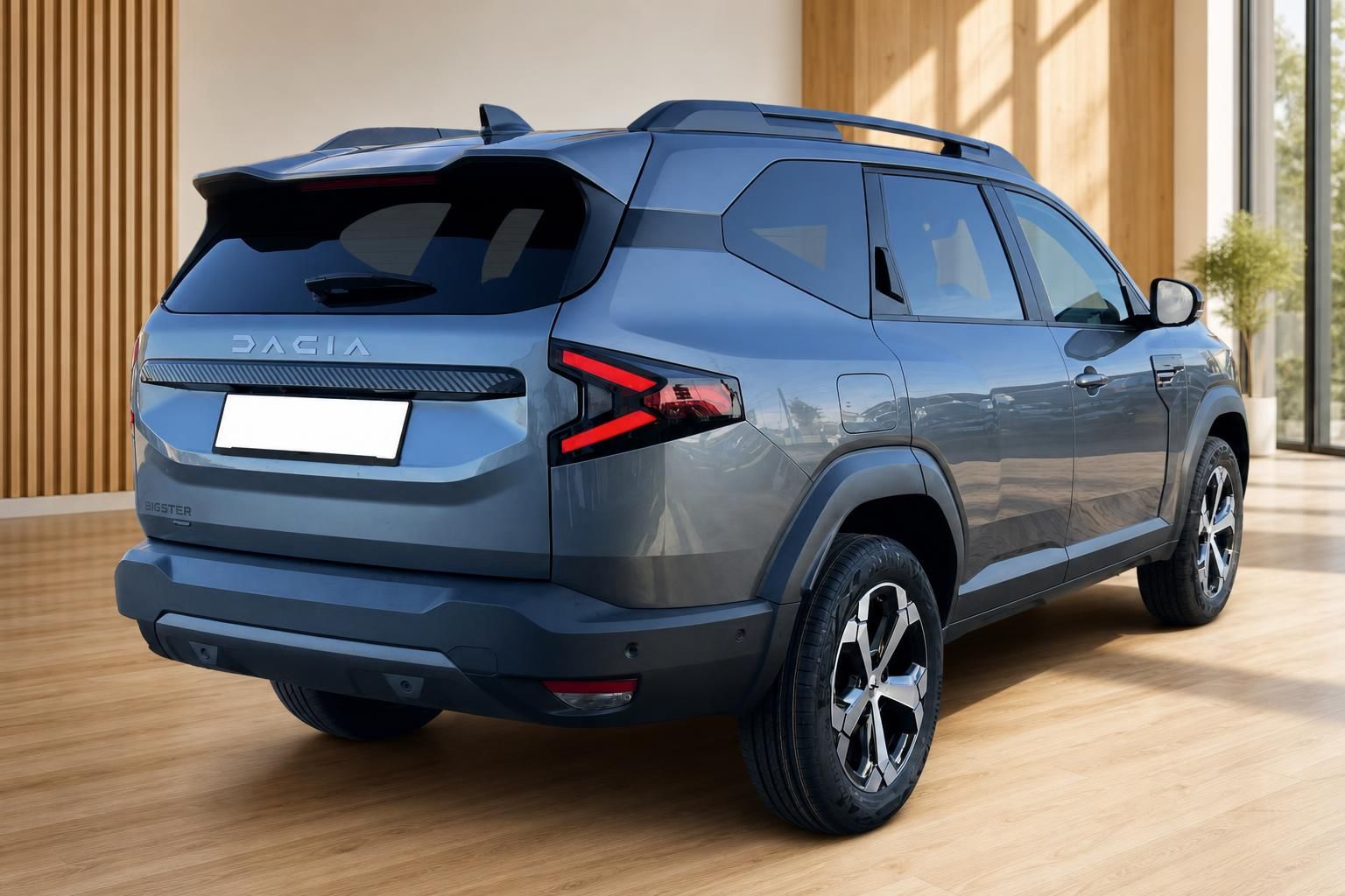 Dacia Bigster SUV Heckansicht in Blaugrau im Showroom