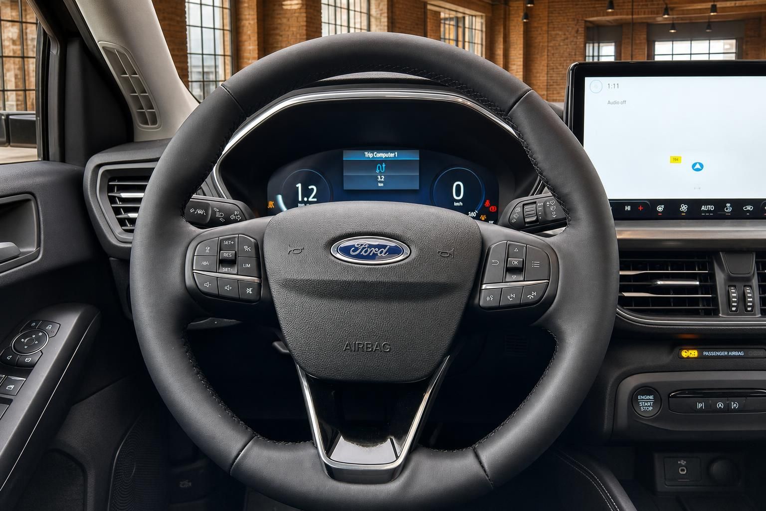 Ford Lenkrad Nahaufnahme mit Bedienelementen und Display