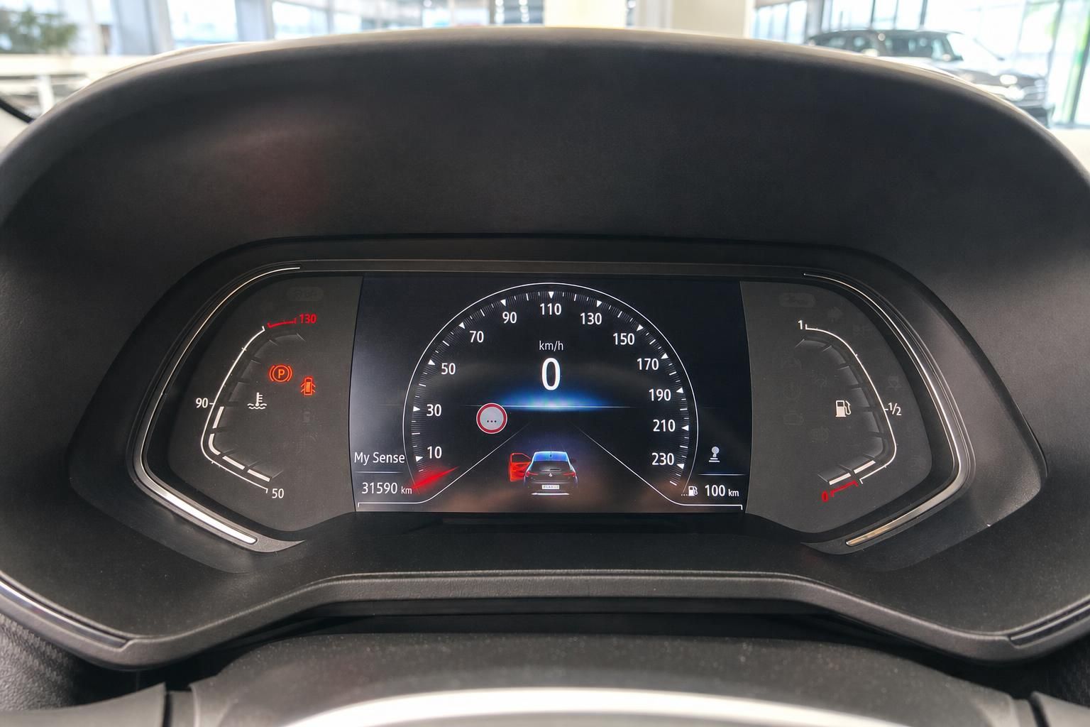 Modernes digitales Kombiinstrument mit Tachometer und Bordcomputer Display im Fahrzeug-Cockpit