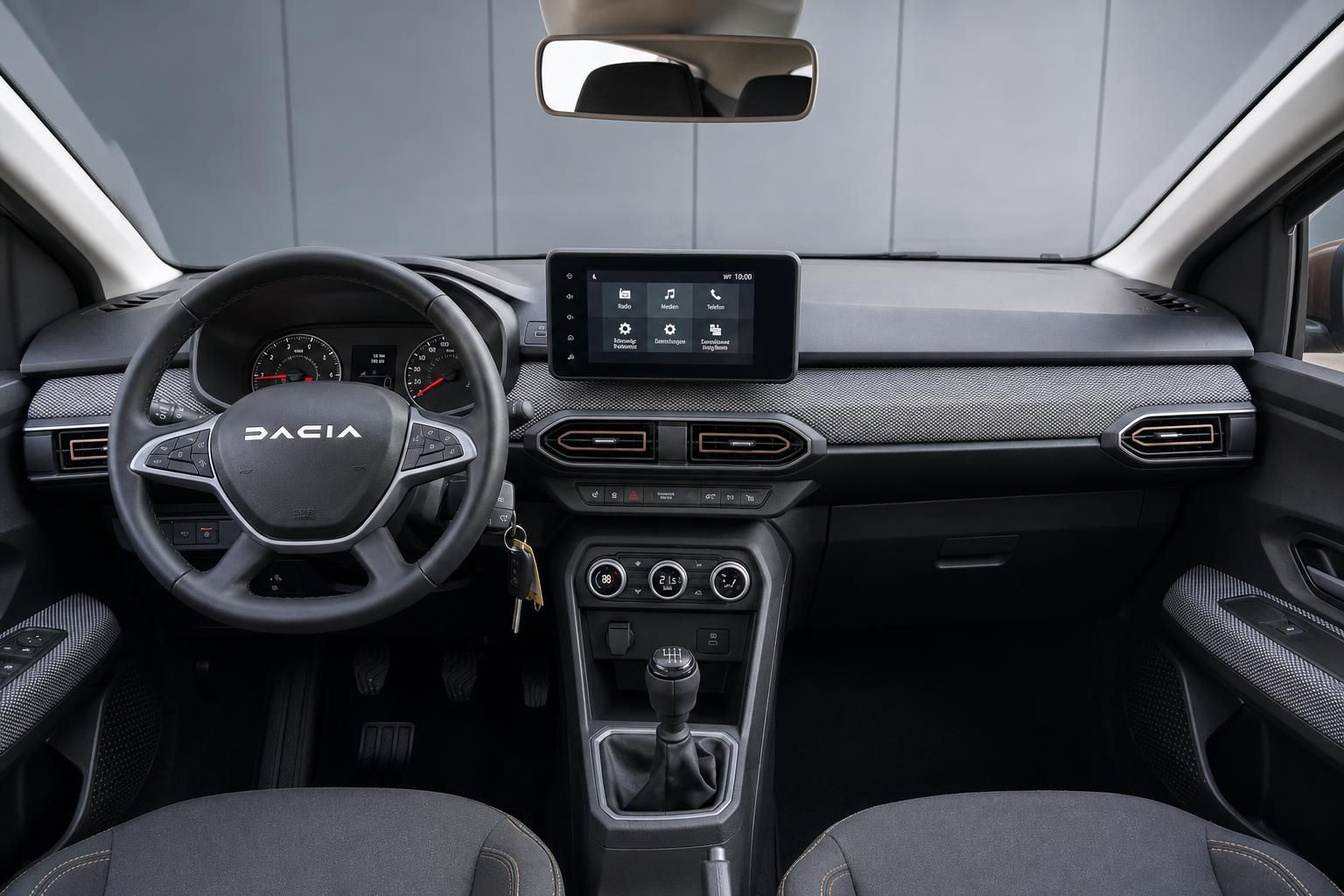 Dacia Fahrzeug Innenraum mit Armaturenbrett, Lenkrad und Touchscreen-Display