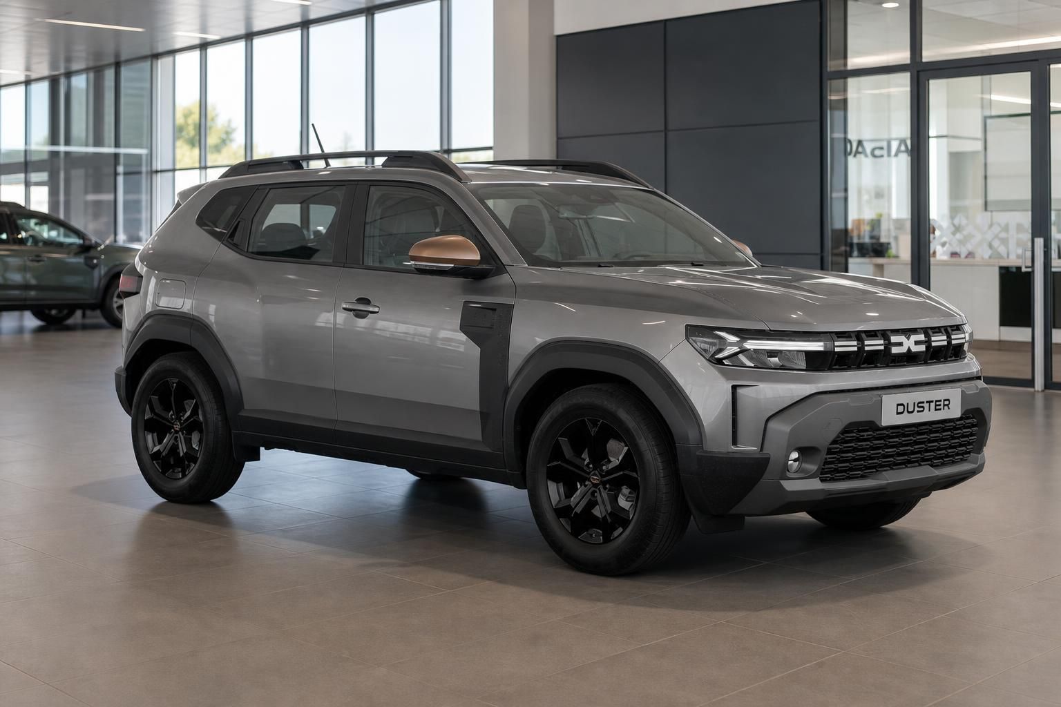Dacia Duster grau, Frontansicht schraeg im Autohaus