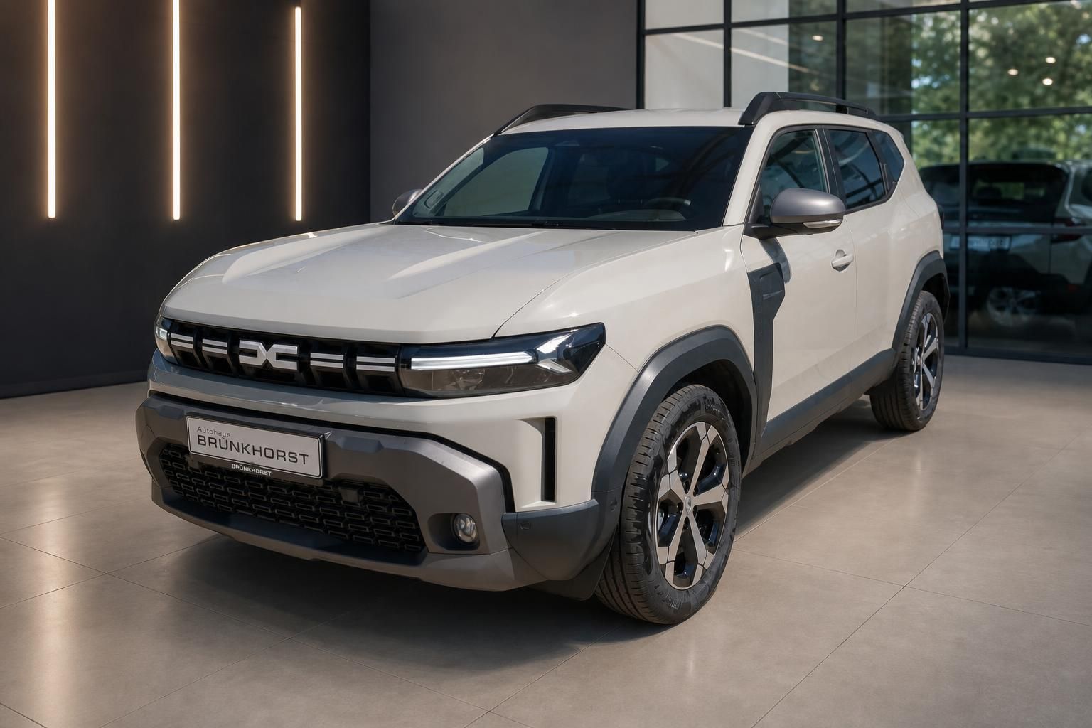 Dacia Duster Hybrid weiss Frontansicht schraeg im Autohaus Brunkhorst