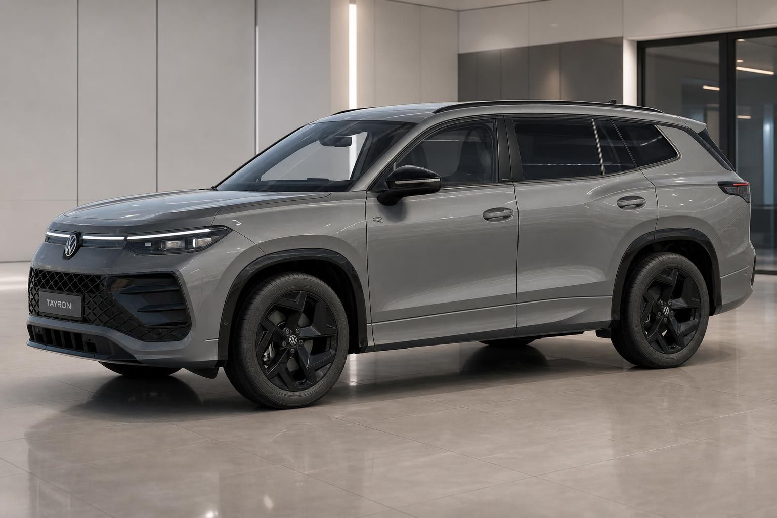 VW Tayron SUV in Grau, Frontansicht im Showroom