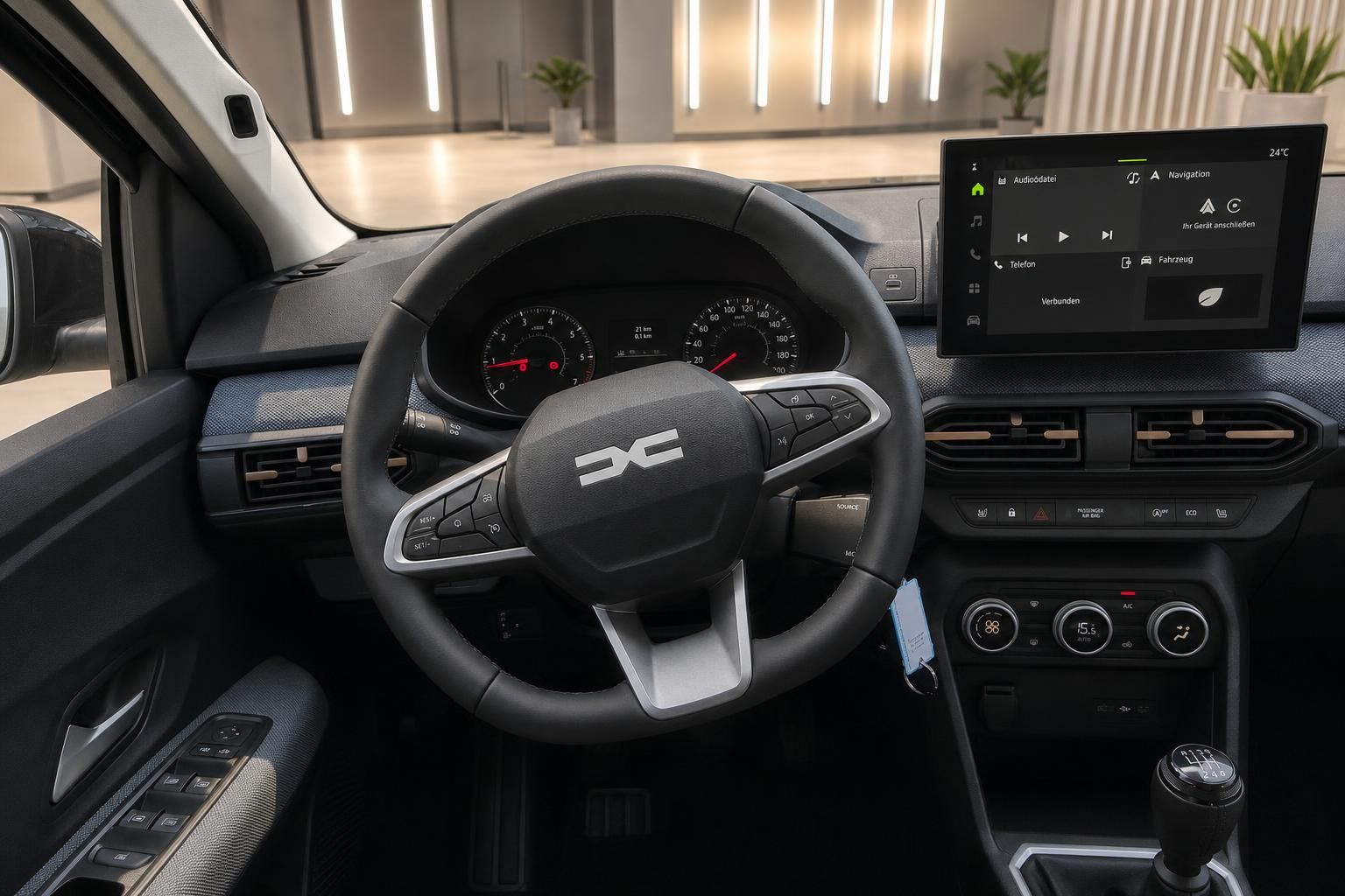 Dacia Cockpit mit Lenkrad, Tacho und Touchscreen-Infotainment