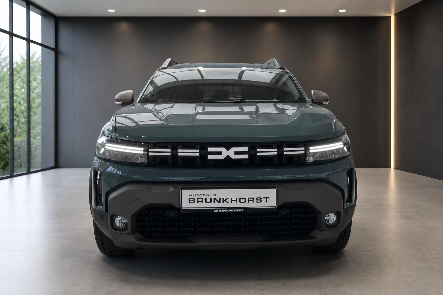 Dacia Duster Frontansicht mit charakteristischem Kühlergrill und LED-Scheinwerfern