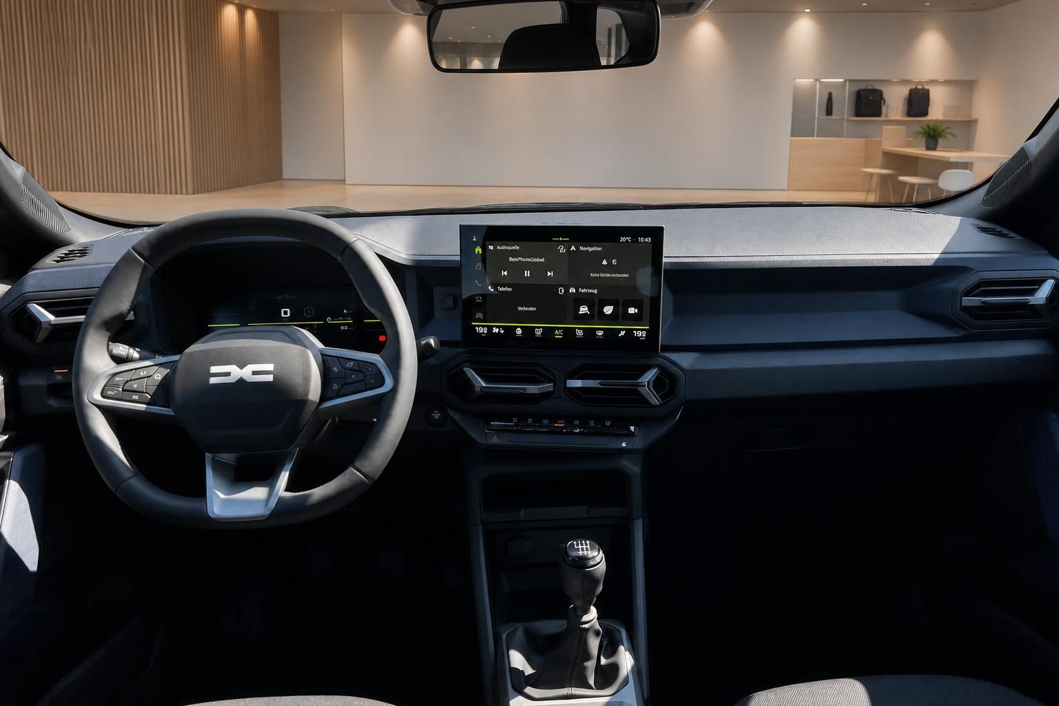 Dacia Cockpit mit Lenkrad und digitalem Infotainment-Display