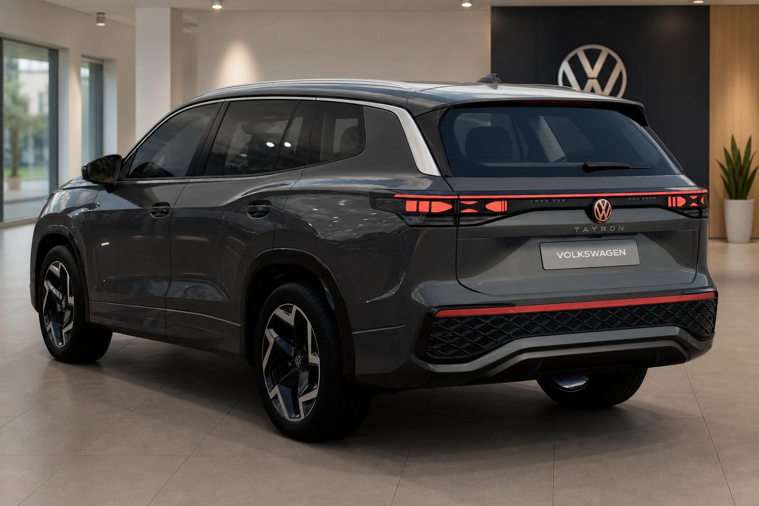 VW Tayron grau Heckansicht im Autohaus
