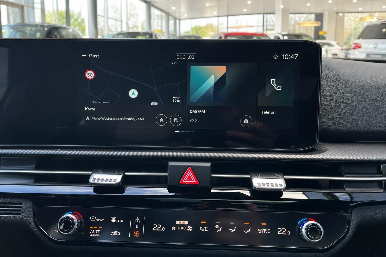 Kia Sportage Infotainment-Display mit Navigation und Klimabedienung