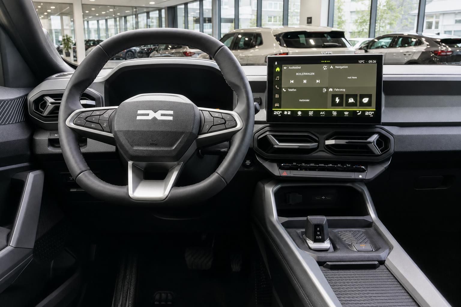 Dacia Bigster Cockpit mit digitalem Display, Lenkrad und Mittelkonsole im Innenraum