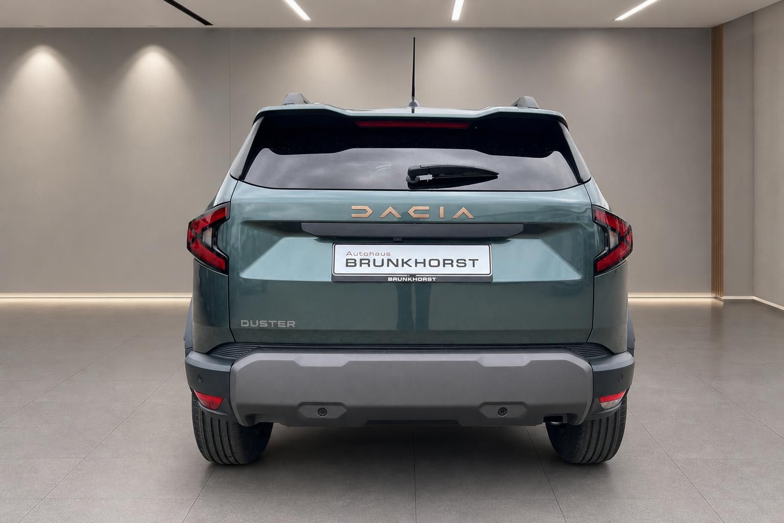 Dacia Duster grün Heckansicht im Autohaus Brunkhorst