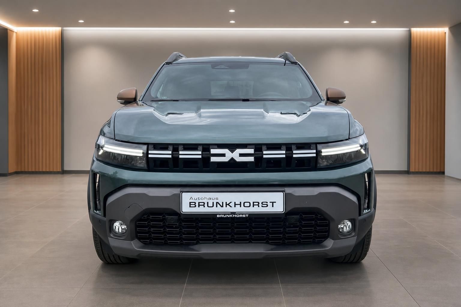 Dacia Duster grün Frontansicht mit LED-Scheinwerfern