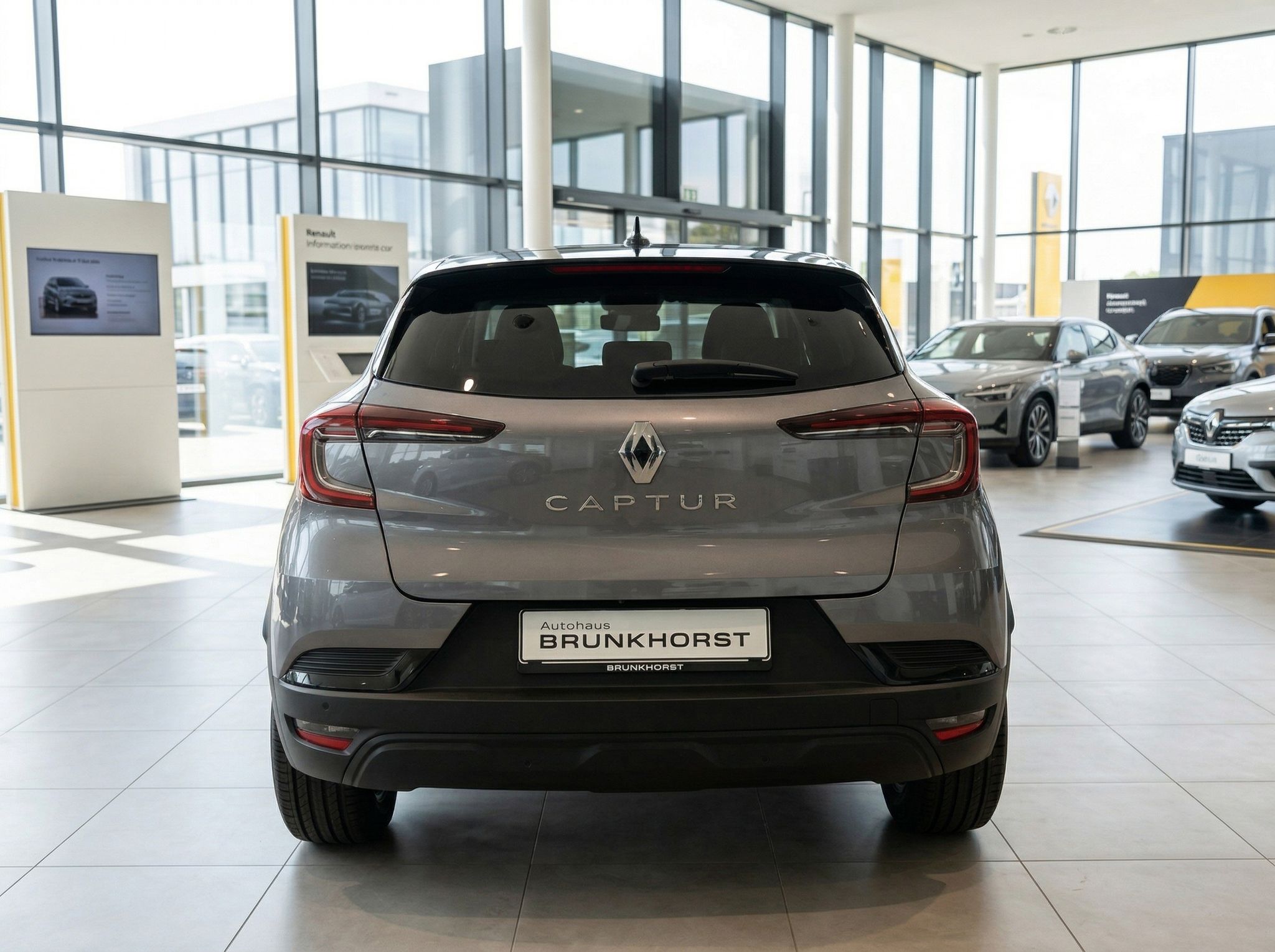Renault Captur Heckansicht mit CAPTUR Schriftzug und Autohaus Brunkhorst Kennzeichen