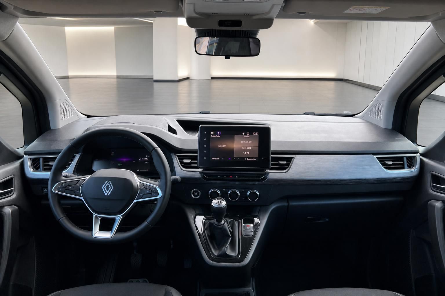 Renault Cockpit mit Lenkrad, Armaturenbrett und zentralem Touchscreen-Display