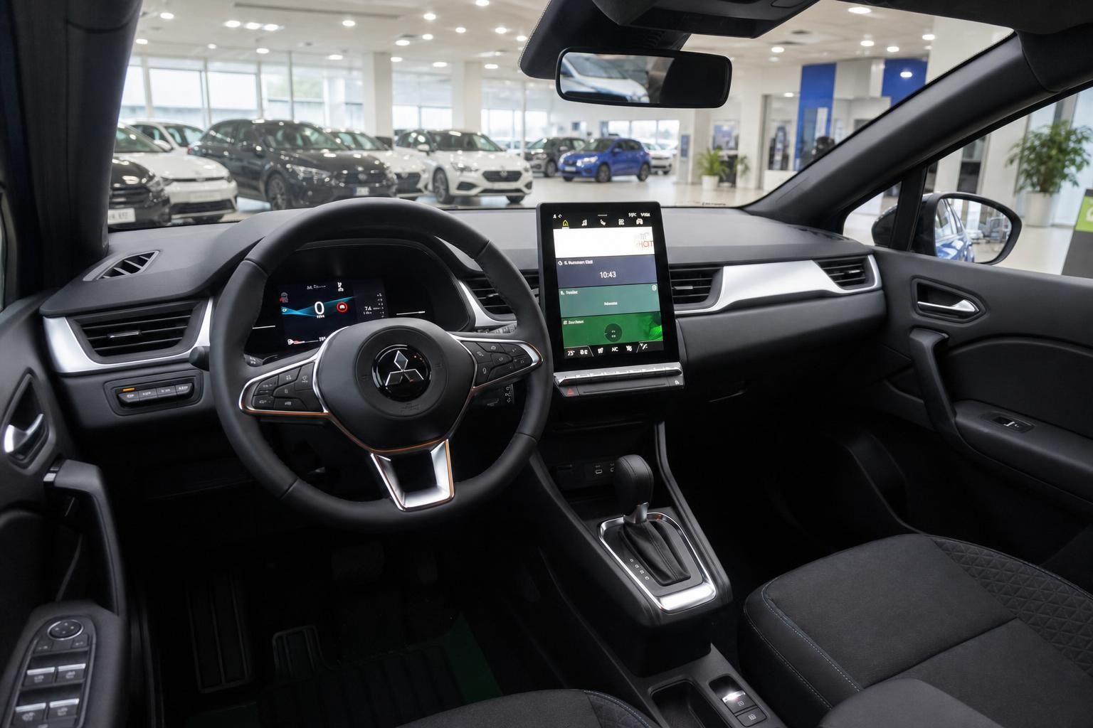 Armaturenbrett mit Touchscreen, Lenkrad und digitalem Tacho im modernen Fahrzeug