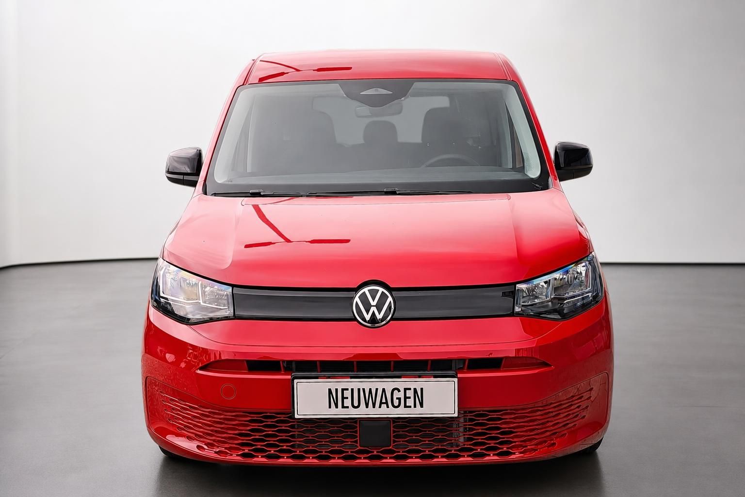 VW Caddy rot Frontansicht Studioaufnahme Neuwagen