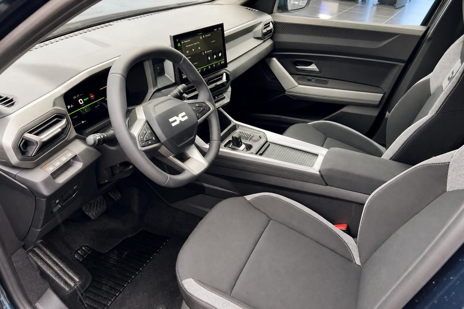 Dacia Bigster Innenraum - modernes Cockpit mit Touchscreen und hochwertige Ausstattung in Grau