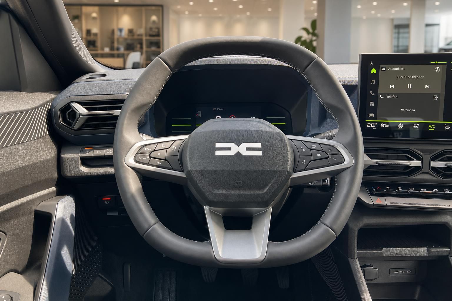 Dacia Lenkrad mit Multifunktionstasten und digitalem Cockpit im Detail