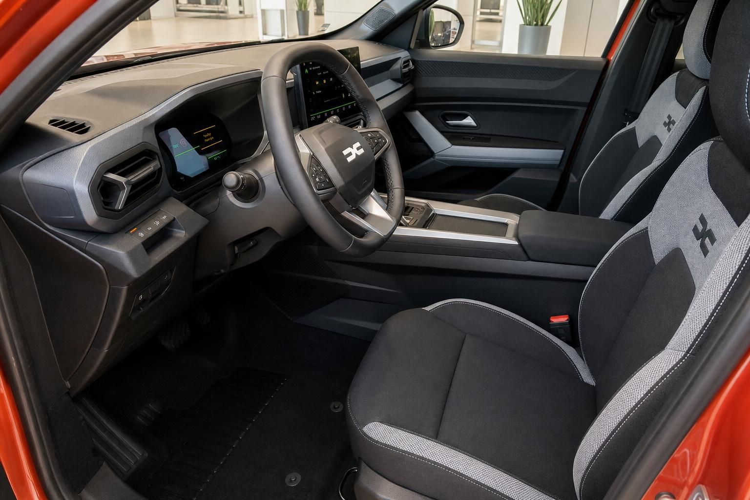 Dacia Bigster Innenraum mit Sitzen, Lenkrad und Cockpit Ansicht