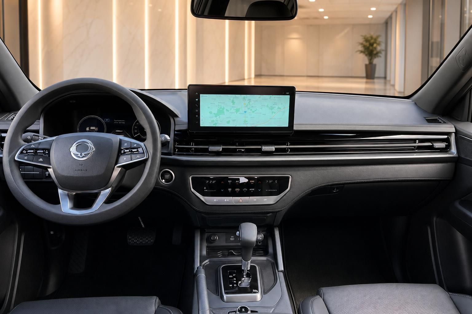 SsangYong Pickup Innenraum mit digitalem Display, Lenkrad und Mittelkonsole - Cockpit-Ansicht