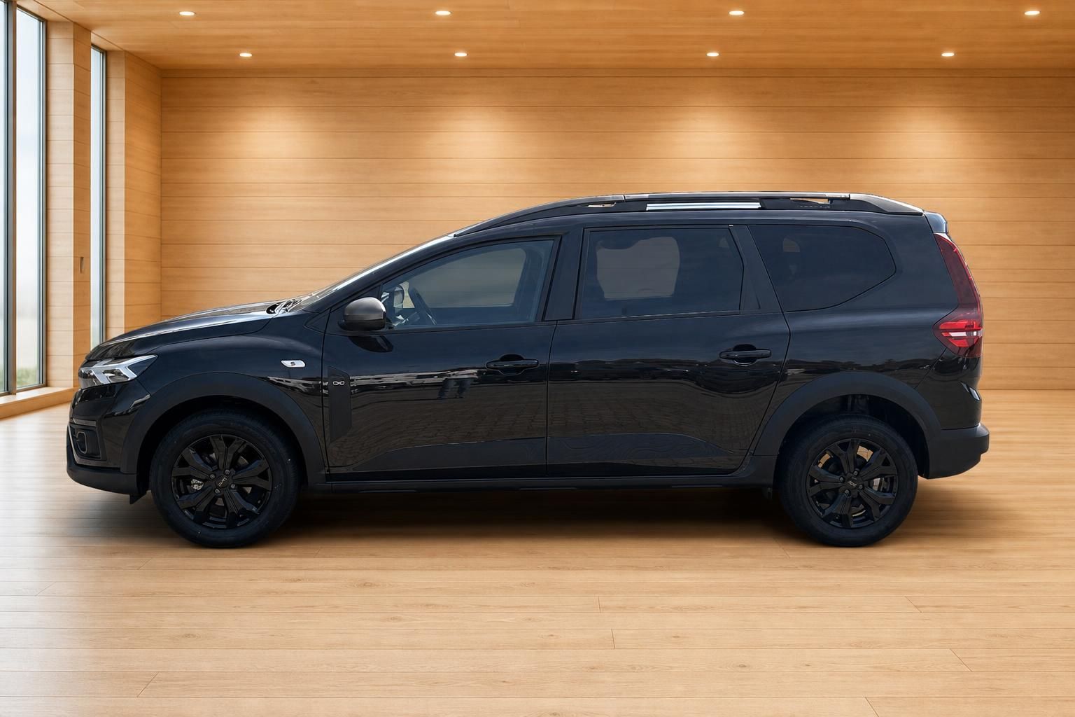 Dacia Jogger schwarz Seitenansicht im Autohaus
