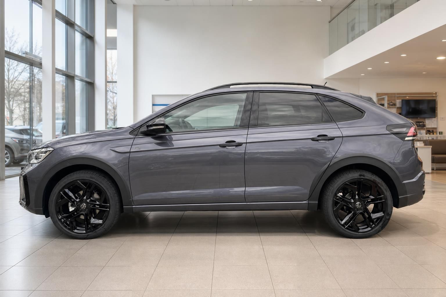 VW Volkswagen SUV Coupé grau metallic Seitenansicht schwarze Felgen Autohaus