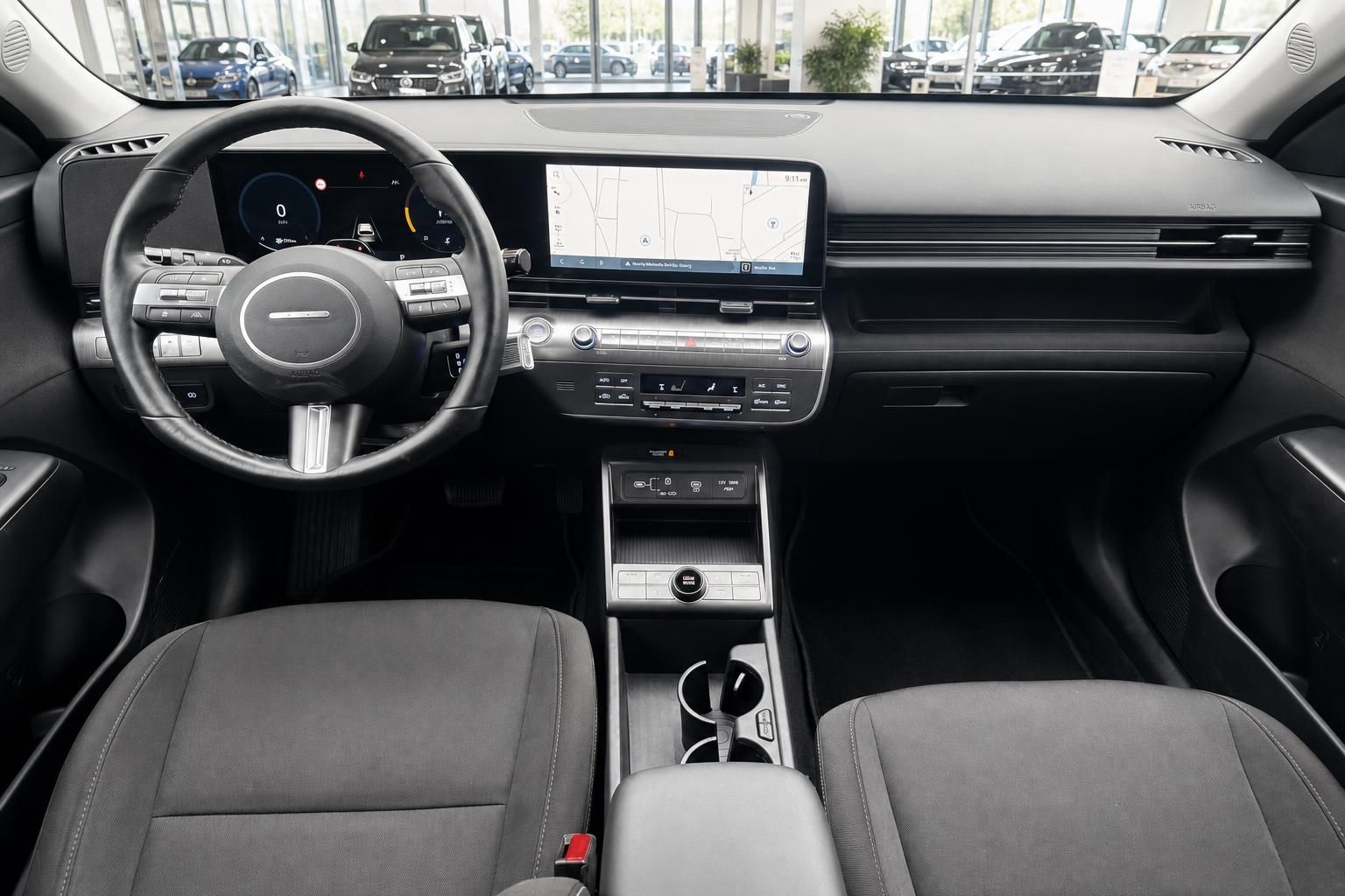 Hyundai Tucson Innenraum – Cockpit mit Lenkrad, digitalem Kombiinstrument und Navigationssystem